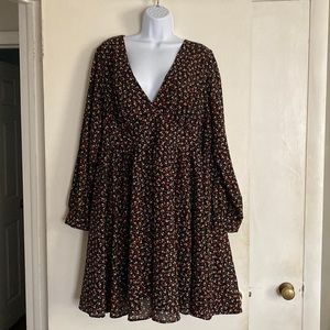 Torrid floral v neck, knee length dress. Long sleeves with zipper back